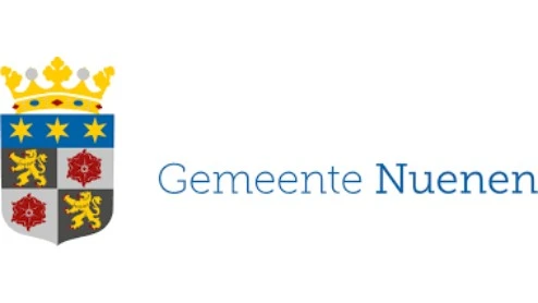 Logo van de gemeente Nuenen, met een wapen met leeuwen, sterren, rode symbolen en een gouden kroon, naast de tekst "Gemeente Nuenen.